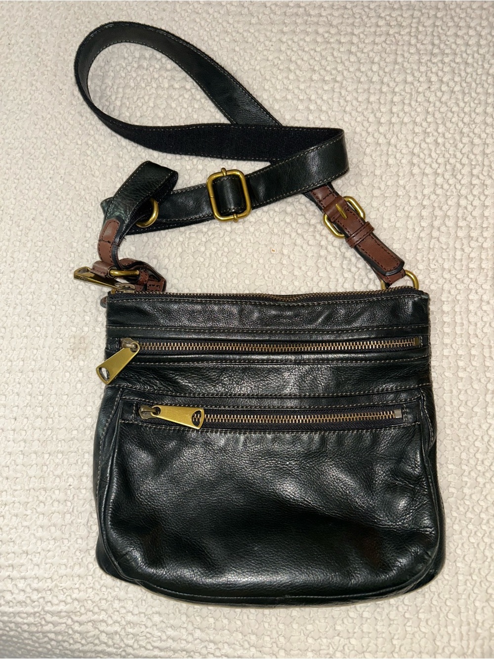 Fossil Black Leather Crossbody with Gold Hardware and Brown Strap Accents